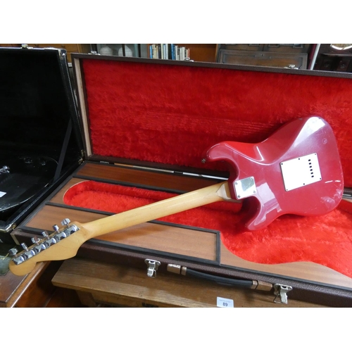 72 - An Encore six string electric guitar in hard carrying case