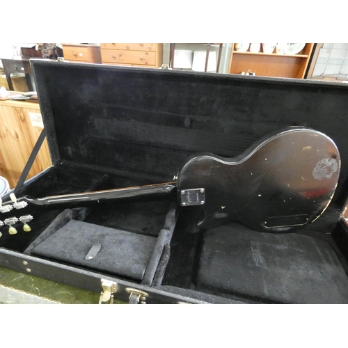 73 - An Epiphone Junior model six string electric guitar with hard carrying case