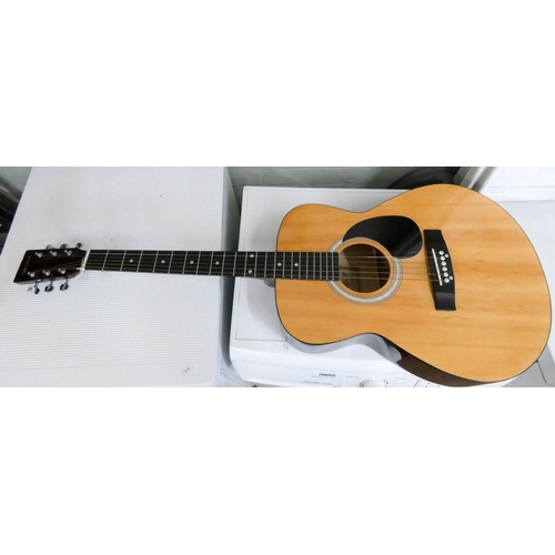 74 - An elevation six string acoustic guitar