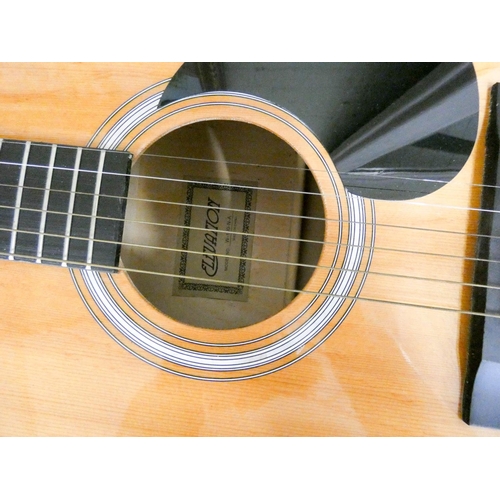 74 - An elevation six string acoustic guitar