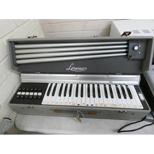 761 - A Lorenzo electric keyboard in fitted box with legs fitted inside etc