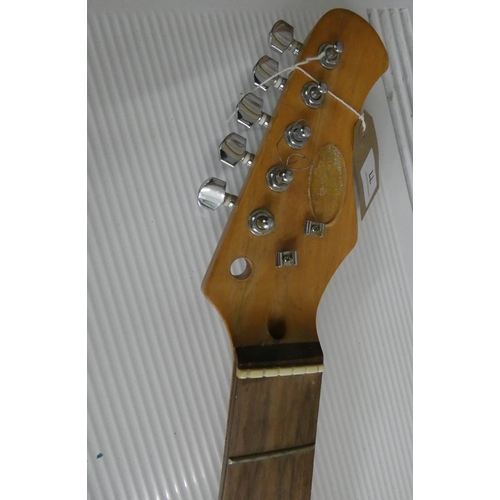 77 - A Stagg six string electric guitar