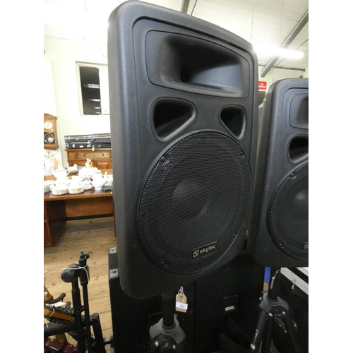 84 - A good pair of Skytech speakers with folding tripod stands