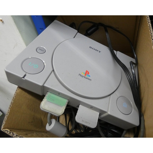 819 - A Sony PlayStation with controllers, games etc