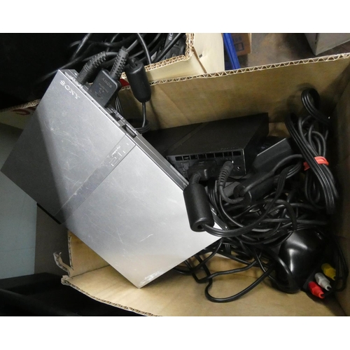 826 - Two PlayStation 2's with controllers etc