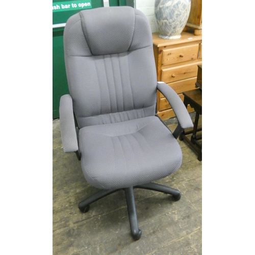 206 - A revolving office chair in mauve covering