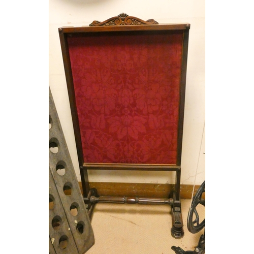 266 - A Victorian mahogany fire screen with pull out red upholstered panel