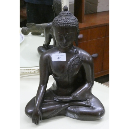 304 - A bronze Saky Amuni Buddha figure ornament, approximately 12