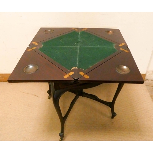 307 - An Edwardian mahogany envelope top card table, 21