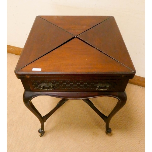 307 - An Edwardian mahogany envelope top card table, 21