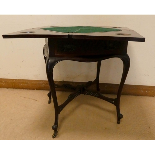 307 - An Edwardian mahogany envelope top card table, 21