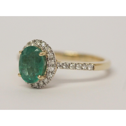 485 - 14ct gold emerald and diamond oval cluster ring, with diamond shoulders, hallmarked , ring size P