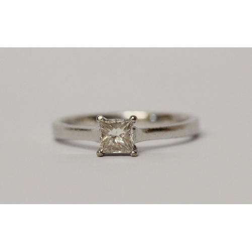 494 - A diamond engagement ring, with princess cut diamond weighing approximately 0.5 carat within simple ... 