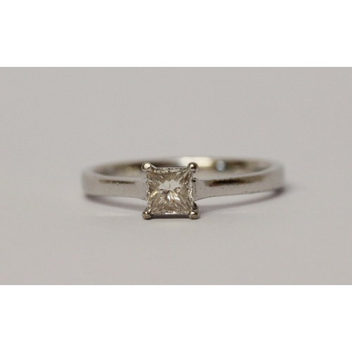 494 - A diamond engagement ring, with princess cut diamond weighing approximately 0.5 carat within simple ... 