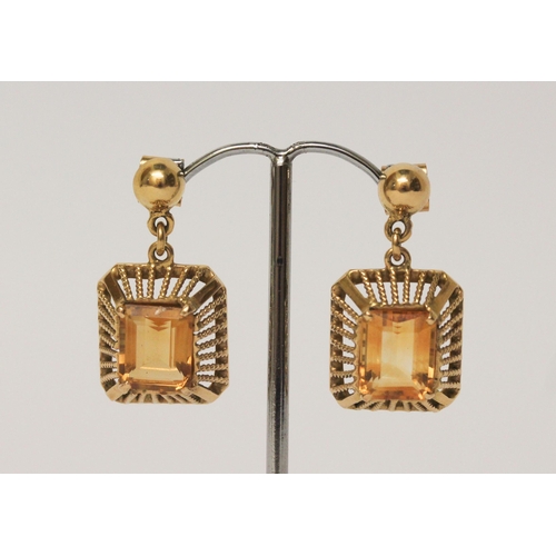 508 - A pair of citrine drop earrings, matching the preceding lot. Unmarked yellow metal tests as 18ct. We... 