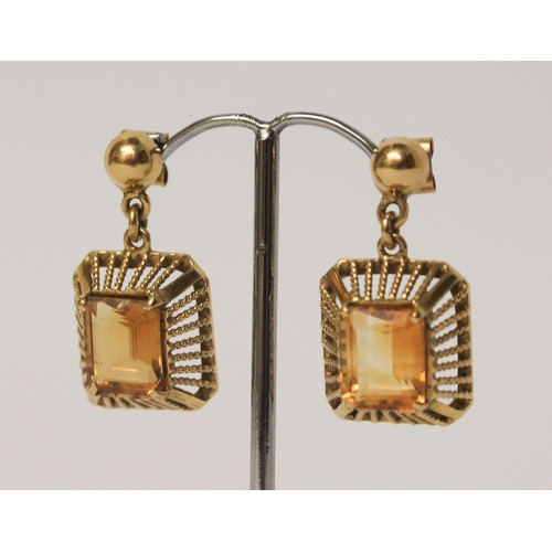 508 - A pair of citrine drop earrings, matching the preceding lot. Unmarked yellow metal tests as 18ct. We... 