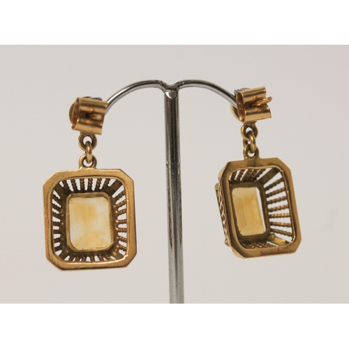 508 - A pair of citrine drop earrings, matching the preceding lot. Unmarked yellow metal tests as 18ct. We... 