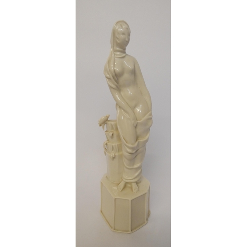 196 - Wiener Werkstatte blanc de chine porcelain figure of a scantily clad maiden bathing, 26cms tall, imp... 