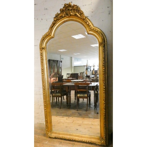 236 - A very large gilt framed and bevelled glass wall mirror, 83