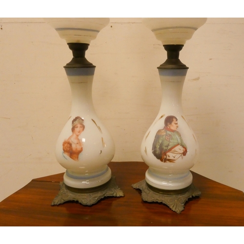 267 - A pair of Victorian Napoleon and Josephine decorated opaline glass oil lamps on brass bases, 30