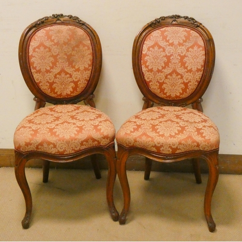 272 - A pair of Victorian walnut dining or occasional chairs on cabriole legs with upholstered seats and b... 