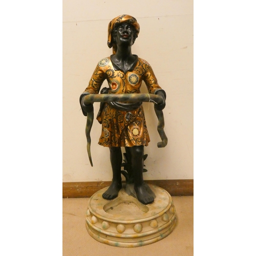 273 - A gilt decorated Blackamoor figure holding a snake umbrella stand, 49