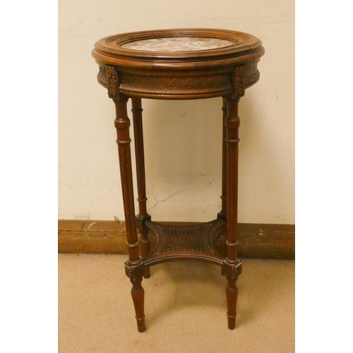 290 - A French two tier walnut plant table with inset marble top and cane under tier, 15