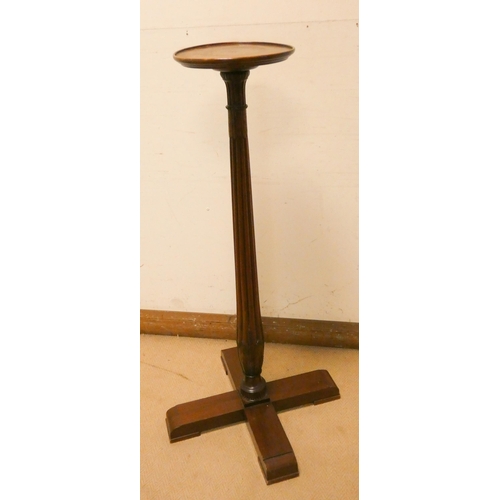 300 - A late Victorian mahogany torchiere on reeded column and platform base