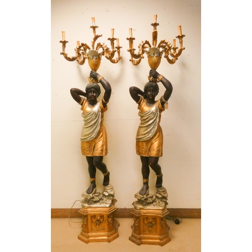 308 - A pair of tall Blackamoor figure candle holders, wired for electricity, each 7'3 tall