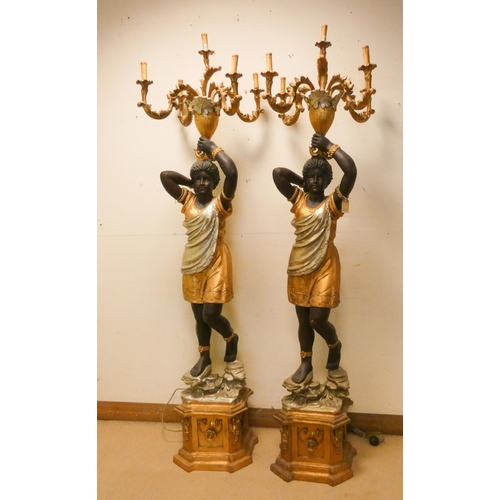 308 - A pair of tall Blackamoor figure candle holders, wired for electricity, each 7'3 tall