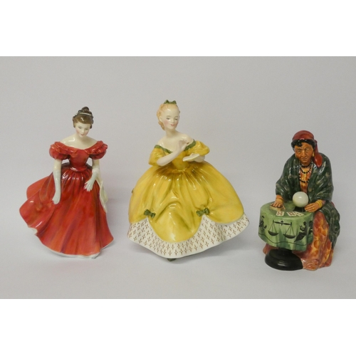 329 - Royal Doulton figurine 'Fortune Teller' together with two further Royal Doulton ladies