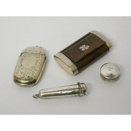 437 - A hallmarked silver cigar holder, small pill box, silver plated vesta case and a snuff box