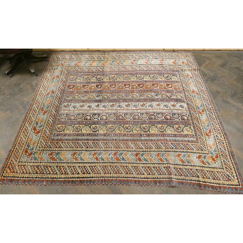 325 - A patterned Persian carpet measuring 8'3 X 7'10 approximately