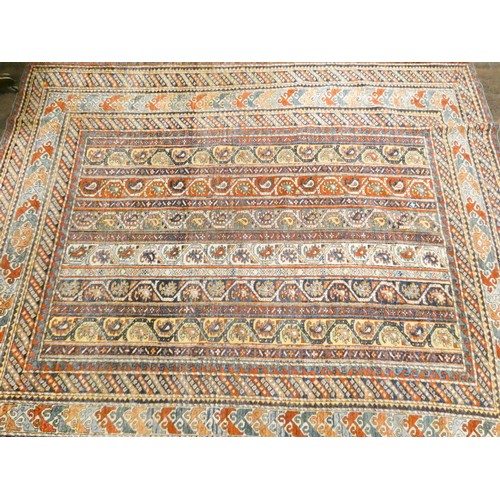 325 - A patterned Persian carpet measuring 8'3 X 7'10 approximately