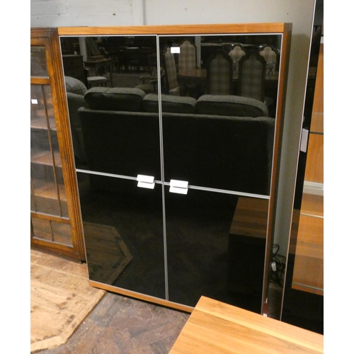 221 - Modern teak and smoked glass four door cocktail or storage cabinet, 40