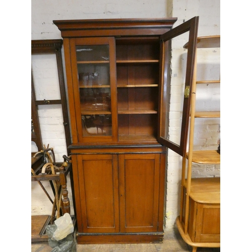 315 - A late Victorian mahogany glazed bookcase with cupboards under, 3' wide