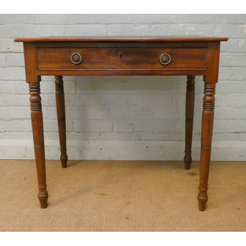 357 - A small Victorian mahogany writing table with inset red leather top fitted one long drawer on turned... 