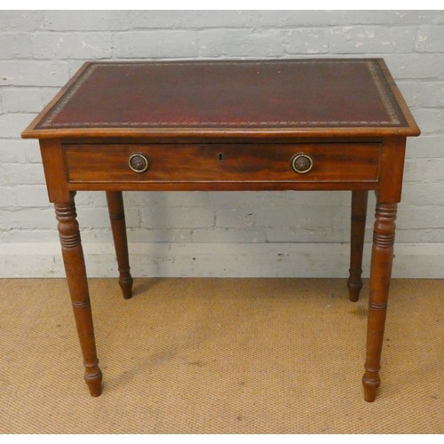 357 - A small Victorian mahogany writing table with inset red leather top fitted one long drawer on turned... 