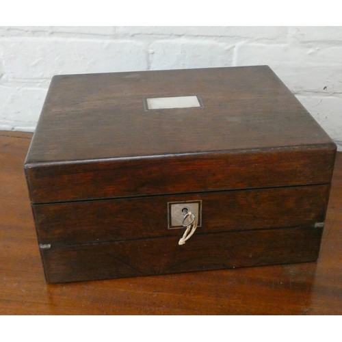 354 - A Victorian rosewood work box with various sewing materials, lift out compartments with writing slop... 