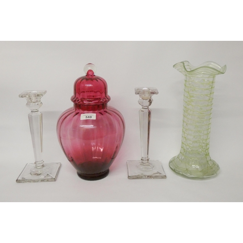 348 - A large cranberry glass ginger jar and cover, pair of pressed Art Deco candlesticks and an Art Nouve... 