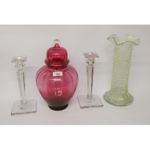 348 - A large cranberry glass ginger jar and cover, pair of pressed Art Deco candlesticks and an Art Nouve... 