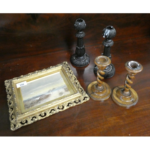 356 - A pair of carved lignum vitae oriental candlesticks, pair of barley twist candlesticks and a small w... 