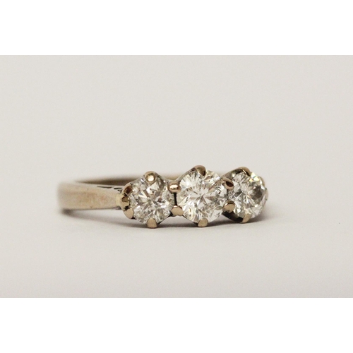 469 - Modern three stone diamond trilogy ring, set with 1ct of diamonds on an 18ct white gold band, ring s... 