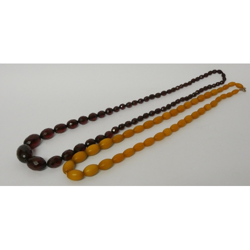 471 - A long vintage row of faceted cherry amber beads and another row of amber beads.