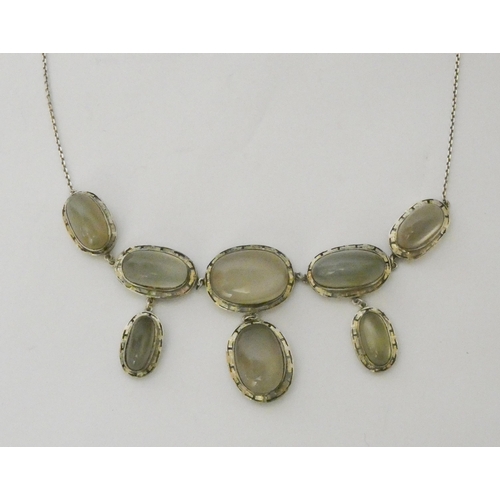 479 - A Moonstone fringe necklace, set in unmarked white metal