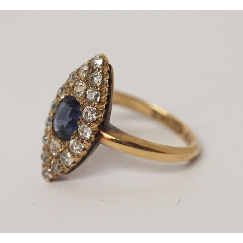 496 - An antique sapphire and diamond marquise panel shaped cluster ring, the oval-shaped sapphire is set ... 