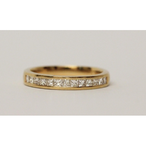 498 - 18ct yellow gold princess cut diamond channel set half hoop eternity ring, size N, 3.5gms