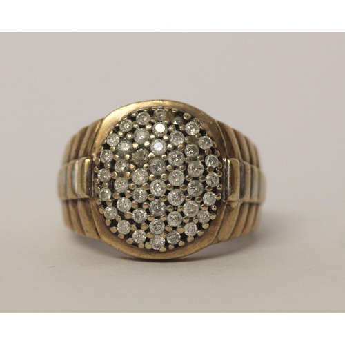 516 - A gents diamond cluster panel signet ring in the style of Rolex, ring size U, 8.5gms, tests as 9ct g... 