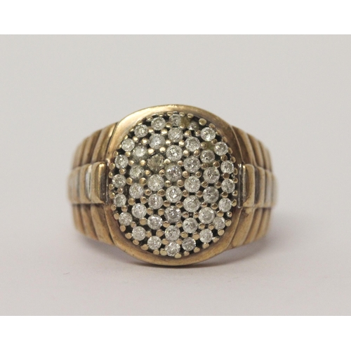 516 - A gents diamond cluster panel signet ring in the style of Rolex, ring size U, 8.5gms, tests as 9ct g... 