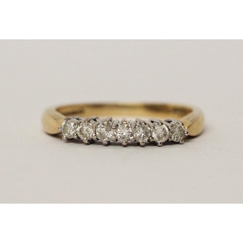 532 - 18ct gold half hoop diamond ring set with a quarter of a carat of diamonds, ring size L, 2.8gms